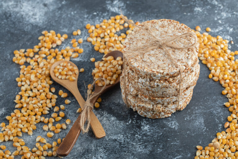 Crisp bread in rope with uncooked popcorn seeds. High quality photo